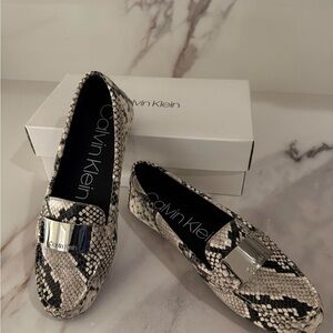 Calvin Klein Black and Cream Loafers for Timeless Elegance